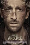 Close-up of a distressed man’s face from the movie Wrecked, depicting themes of struggle and survival.