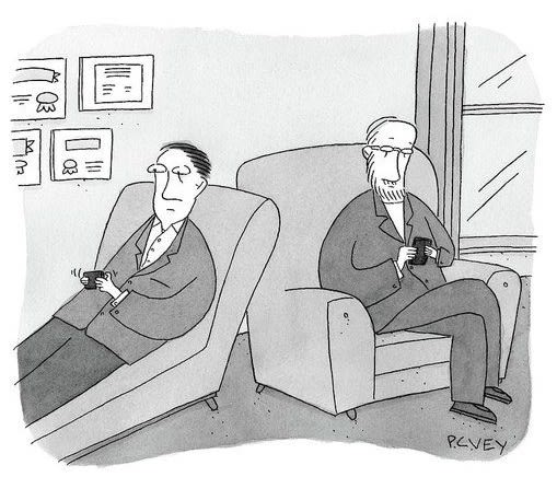 Two seated men in a therapy session, one reclining with a serious expression and the other listening attentively while holding a cup.