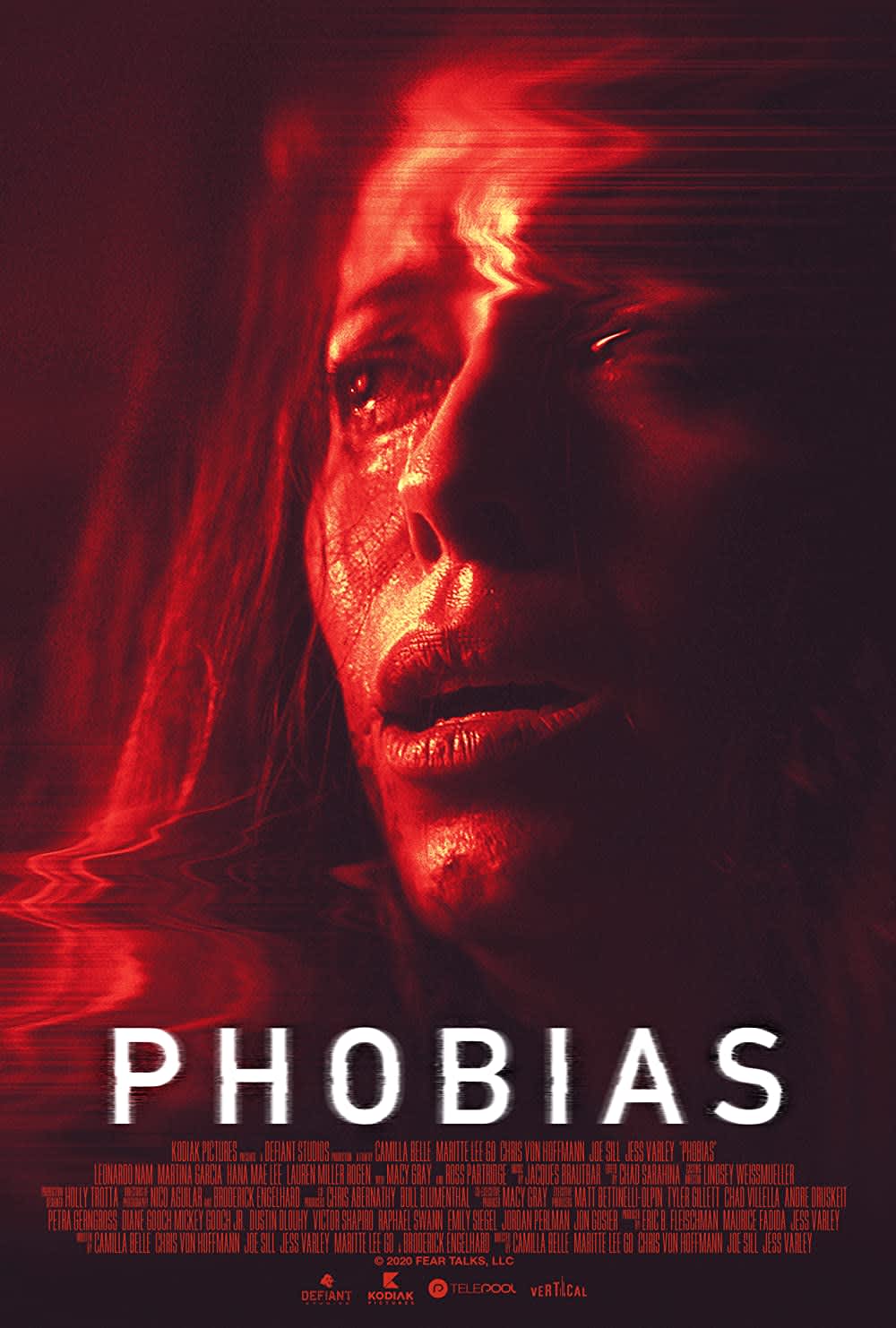 Distorted close-up of a woman's face with a fearful expression, promoting the movie Phobias about extreme phobias.