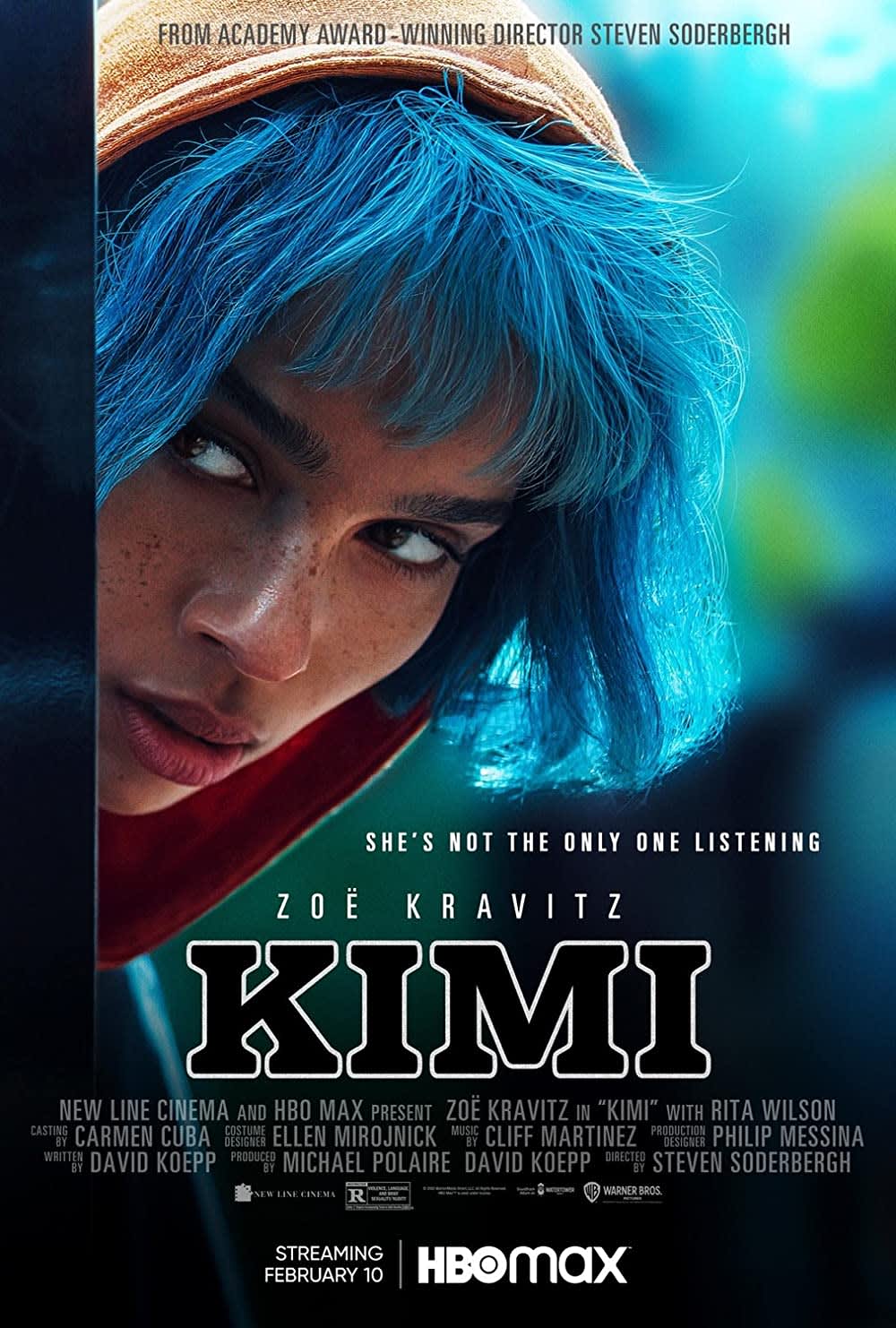 Zoe Kravitz as Kimi, peering through a door, in a film exploring agoraphobia and uncovering a mystery. Streaming on HBO Max.