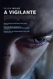 Close-up of a woman's face with visible scars, featuring the title A Vigilante and quotes highlighting the film's strong themes on abuse.