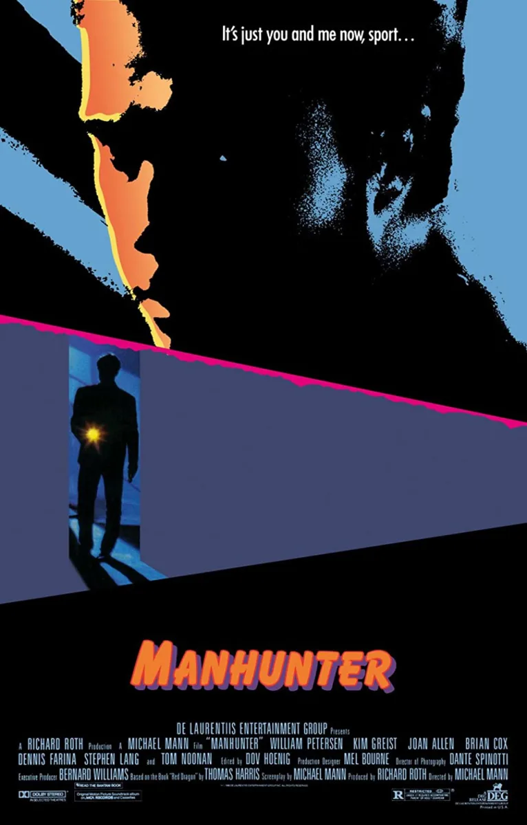 Alt text: Movie poster for 'Manhunter' featuring a silhouette of a man holding a flashlight against a dark background.