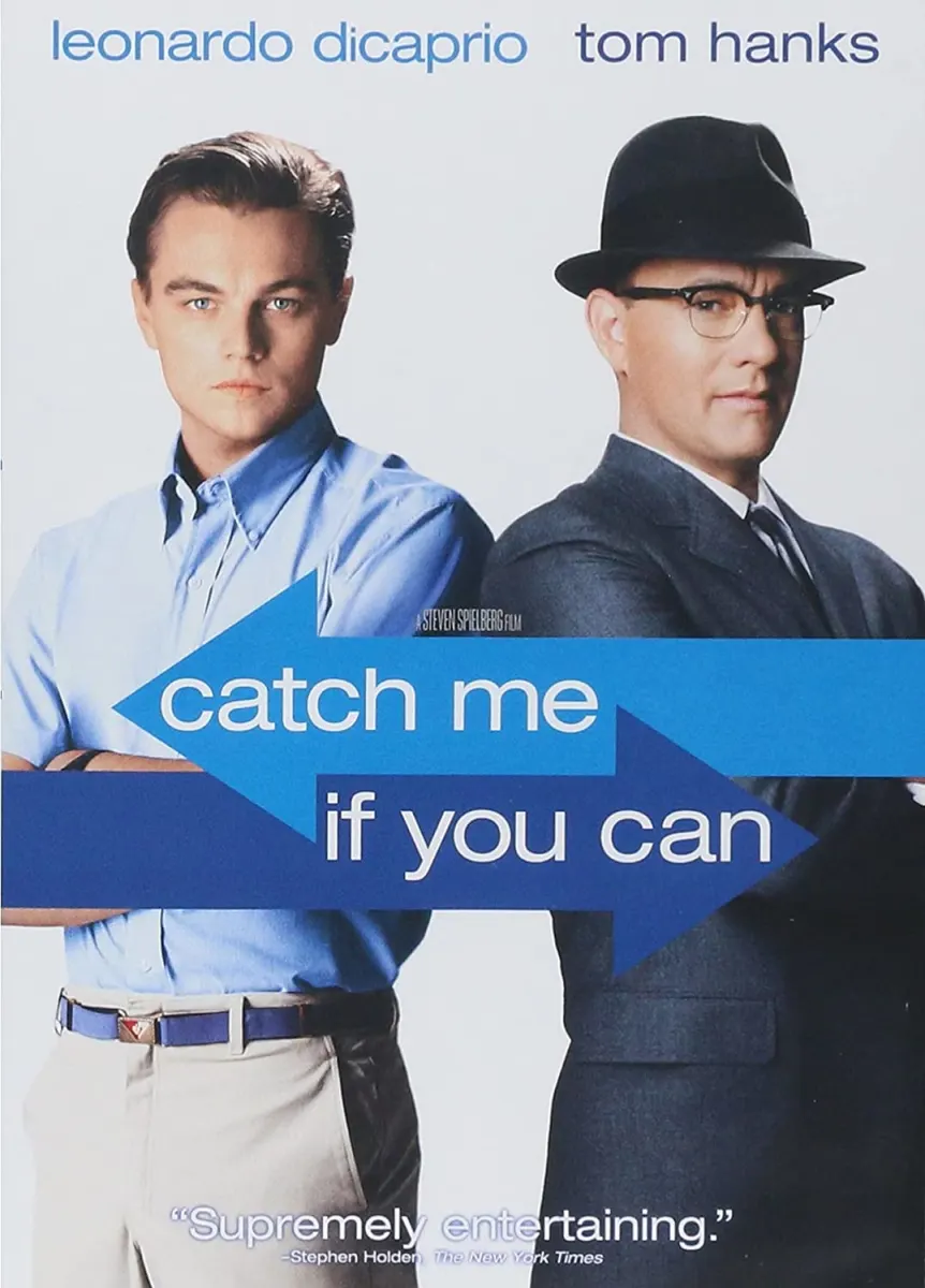 Alt text: Movie poster for 'Catch Me If You Can' featuring Leonardo DiCaprio and Tom Hanks, highlighting themes of deception and pursuit.