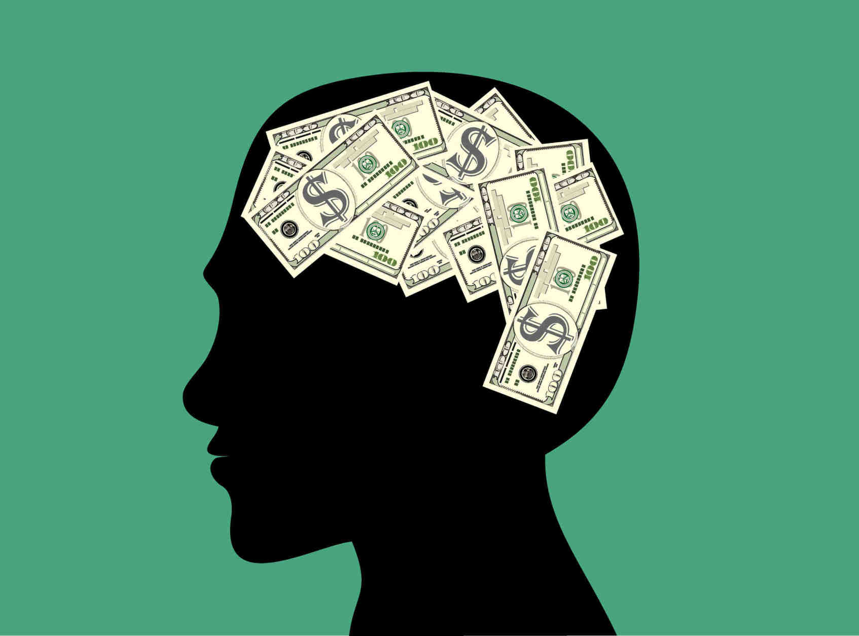 Silhouette of a head filled with dollar bills, illustrating financial considerations in psychology practice management.