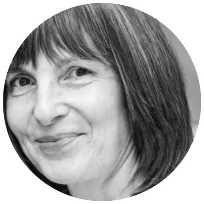 Smiling psychologist providing support for expats and multicultural relationships in Tel Aviv.