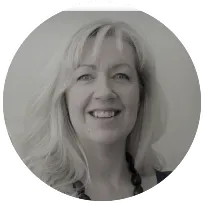 Smiling psychotherapist with long blond hair, focusing on relationship and family counselling in Southampton, UK.