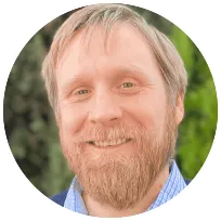 Licensed psychologist with a friendly expression, offering therapy for adults, families, and couples in Fremont.