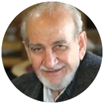 Elderly male psychiatrist with a white beard, reflecting expertise in clinical psychiatry and mental health support.