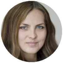 Bilingual psychotherapist with long brown hair, providing individual and couples therapy for emotional wellness.