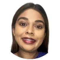 Professional headshot of a mental health specialist with a warm smile, promoting a welcoming atmosphere for therapy services.