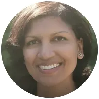 Smiling therapist in a circular frame, emphasizing support for clients facing emotional challenges like anxiety and depression.