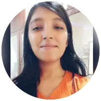 Psychotherapist Tanisha Bhatia smiling, highlighting her experience in integrative and holistic therapy approaches.