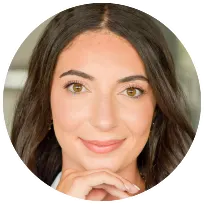 Headshot of registered psychotherapist, highlighting a professional demeanor and supportive presence for clients seeking emotional wellness.