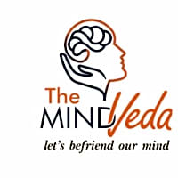 Logo of The Mind Veda, a mental health clinic in Delhi, emphasizing support for mental well-being and child development.