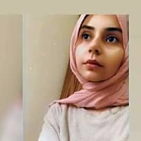 An experienced, competent and compassionate Clinical Psychologist who works with individuals having psychological, emotional and behavioral problems. Young woman in a pink hijab thoughtfully reflecting, illustrating the importance of managing emotions like anger.