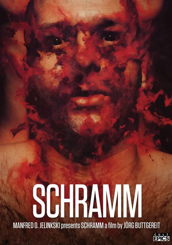 Gruesome poster for the film Schramm, depicting a man's face obscured with red and dark textures, hinting at psychological themes.