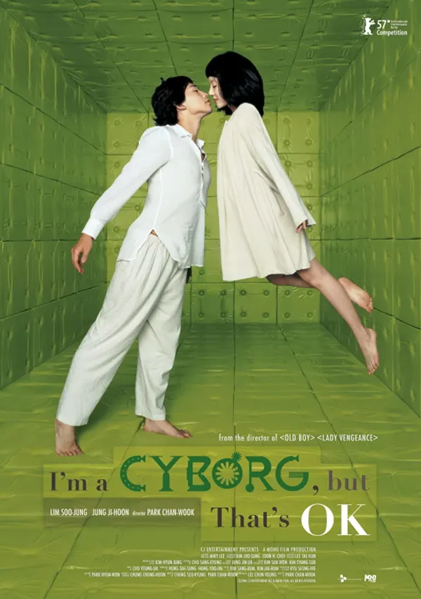 Romantic scene from I'm a Cyborg, but That's OK, featuring a woman in a white dress and a man in a white shirt, floating in a green room.