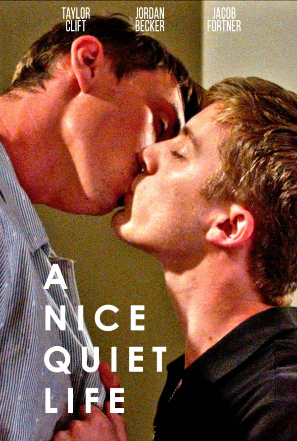 Two men sharing a kiss in the film A Nice Quiet Life, exploring themes of love and connection.