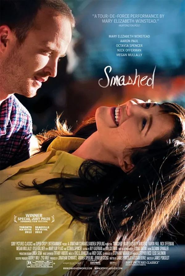 Alt text: Movie poster for 'Smashed' featuring Mary Elizabeth Winstead and Aaron Paul, highlighting themes of alcoholism and recovery.