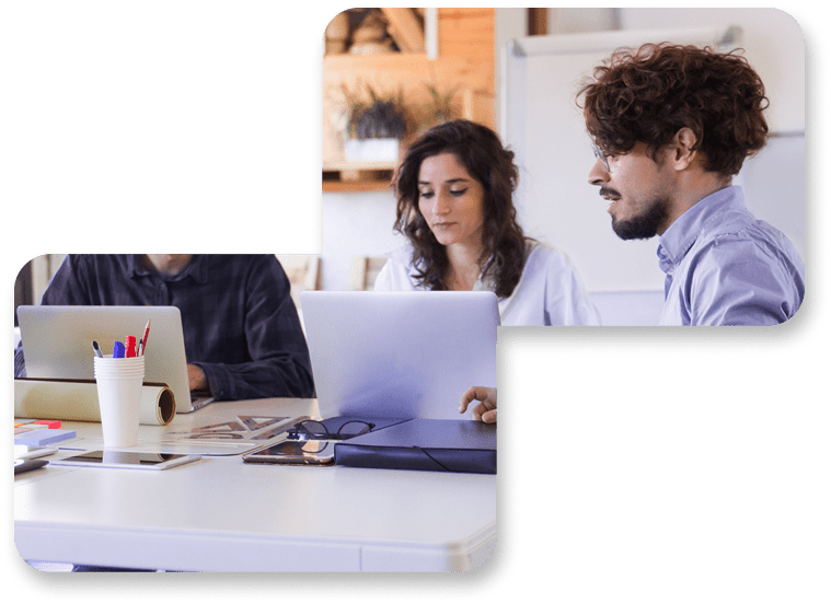 Team collaborating at laptops