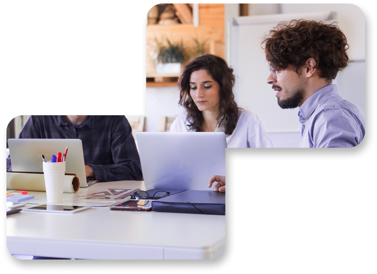 Team collaborating at laptops