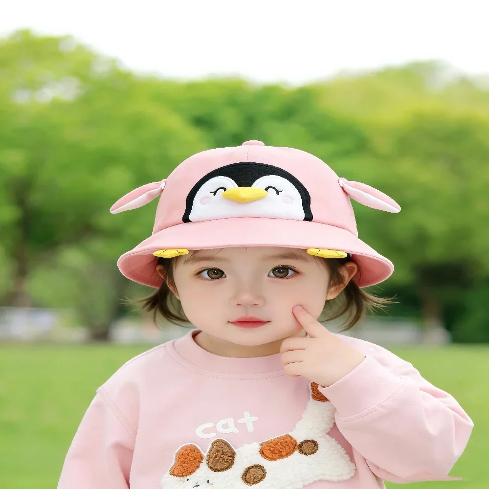 Chapéu Pinguim Fofo Bebê Menina TinySteps: Proteção Solar e Charme para Aventuras ao Ar Livre 3