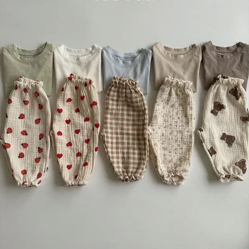 Calça Bebê Unissex Algodão Orgânico TinySteps - Maciez e Conforto para Recém-Nascidos | Estampas Fofas 2
