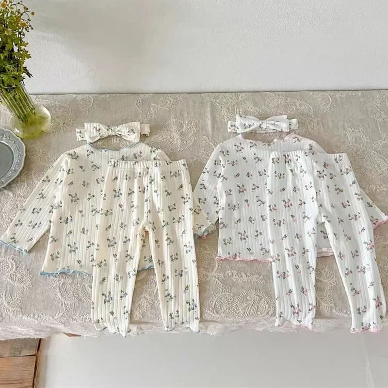 Pijama Floral Algodão Bebê Menina TinySteps: Conforto e Fofura para Noites Tranquilas (0-6 Anos) 2