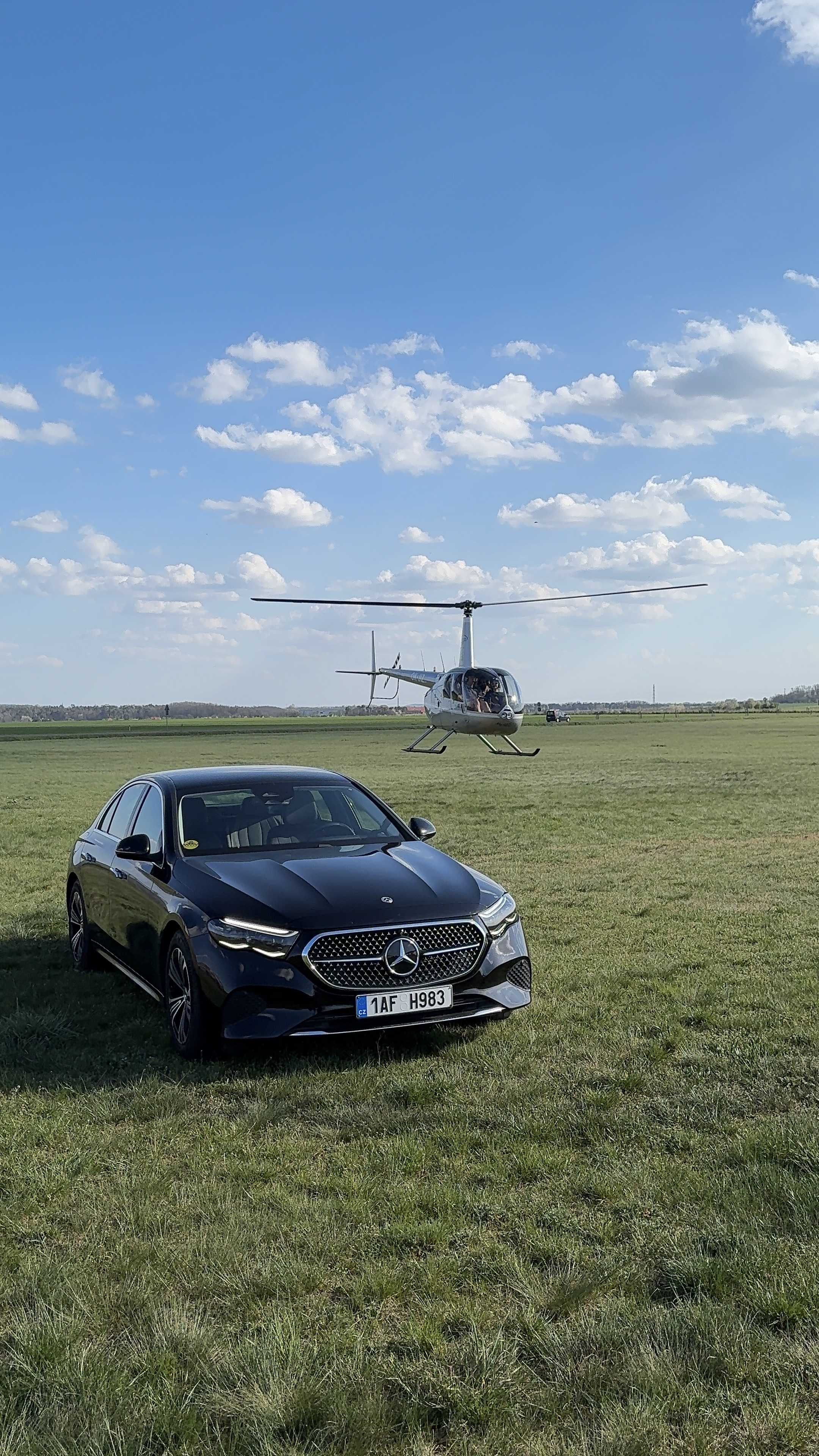 Mercedes E-Class with helicopter