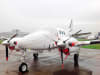 Beech 1900C aircraft fitted with custom canopy, engine, and wing covers for all-weather protection. - Image 2 of 0