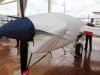 Beech 1900C aircraft fitted with custom canopy, engine, and wing covers for all-weather protection. - Image 4 of 0