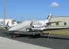 Beech Duke B60 aircraft with a Sunbrella canopy and cockpit cover installed over windshield and side windows. - Image 2 of 0