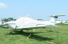 Beech Skipper B77 aircraft fitted with custom canopy, engine, and wing covers for all-weather protection. - Image 5 of 0