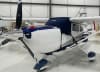 Form-fitting propeller cover on Cessna 206 Stationair shielding blades and spinner from environmental damage. - Image 1 of 0
