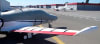 Silver Sunbrella Cirrus SF-50 Vision Jet canopy and nose cover with engine, prop, wing, and empennage protection installed outdoors. - Image 2 of 0