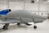 Silver Sunbrella Cirrus SF-50 Vision Jet canopy and nose cover with engine, prop, wing, and empennage protection installed outdoors. - Image 5 of 0