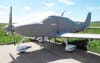 Cirrus SR22 with custom canopy, cockpit, fuselage, engine, propeller, wing, and tail covers installed outdoors. - Image 2 of 0