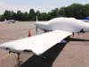 Diamond DA-40 covered with Sunbrella and insulated covers protecting canopy, engine, propeller, wings, and empennage from sun, frost, and snow. - Image 3 of 0