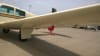 Mooney Mustang aircraft with custom Silver Acrylic Sunbrella canopy, fuselage, engine, wing, and empennage covers for full weather and sun protection. - Image 4 of 0