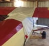Custom Piper PA-12 Super Cruiser and J-5 Cub canopy cover installed, showing reflective Silver Sunbrella fabric protecting the windshield and cabin windows. - Image 3 of 0