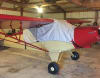 Custom Piper PA-12 Super Cruiser and J-5 Cub canopy cover installed, showing reflective Silver Sunbrella fabric protecting the windshield and cabin windows. - Image 5 of 0