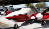 Custom Silver Acrylic Sunbrella canopy and fuselage cover on a Piper PA-30/39 Twin Comanche, protecting windshield, windows, and nose. - Image 3 of 0