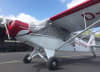 Piper J-4 Cub Coupe equipped with custom Silver Acrylic Sunbrella canopy, engine, propeller, wing, and tail covers. - Image 1 of 0