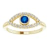 A 14k yellow or white gold diamond and sapphire evil eye ring with 0.24 carats of diamonds. - Image 1 of 0