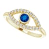A 14k yellow or white gold diamond and sapphire evil eye ring with 0.24 carats of diamonds. - Image 3 of 0