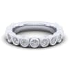 Smooth diamond bezels encompass round brilliant diamonds in this 14k white gold diamond ring. - Image 1 of 0