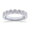 Smooth diamond bezels encompass round brilliant diamonds in this 14k white gold diamond ring. - Image 4 of 0