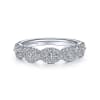 This 14k white gold diamond wedding ring features over one half carat of marquise and round diamonds. - Image 1 of 0