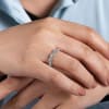 This 14k white gold diamond wedding ring features over one half carat of marquise and round diamonds. - Image 4 of 0