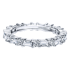 With round and baguette cut diamonds, this 1.25 carat eternity band set in 14k white gold is a delightfully unique piece of wedding jewelry. - Image 1 of 0